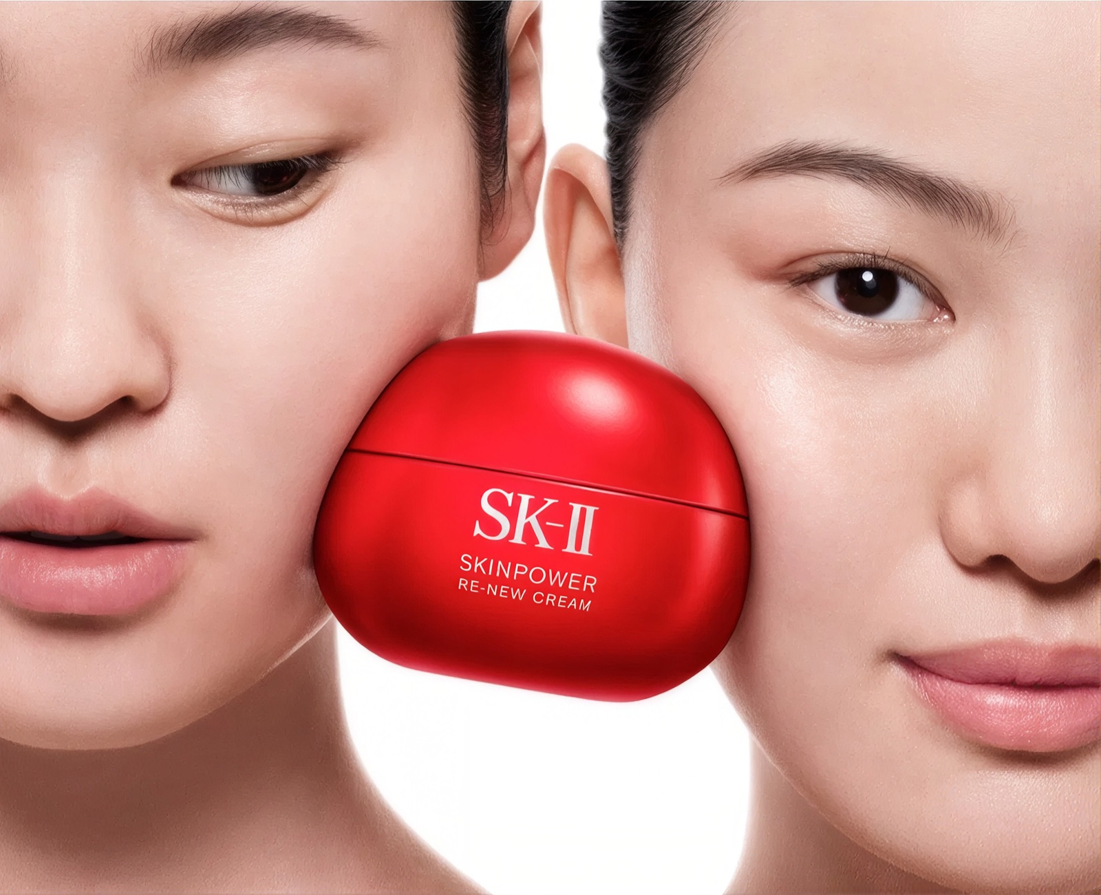 SK-II SKINPOWER Re-New Cream held between two faces